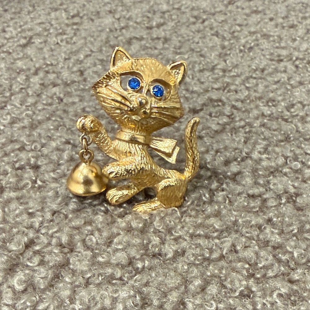 Gold Cat Charm with Blue Rhinestone Eyes - Decorative Pin brooch Avon vintage